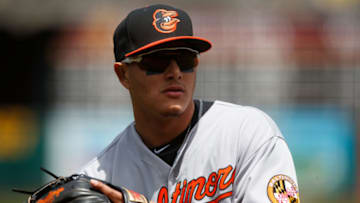 OAKLAND, CA - MAY 06: Manny Machado #13 of the Baltimore Orioles stands outside the dugout before the game against the Oakland Athletics at the Oakland Coliseum on May 6, 2018 in Oakland, California. The Oakland Athletics defeated the Baltimore Orioles 2-1. (Photo by Jason O. Watson/Getty Images) *** Local Caption *** Manny Machado