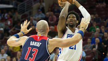 Oct 6, 2016; Philadelphia, PA, USA; Philadelphia 76ers center Joel Embiid (21) shoots the ball over Washington Wizards center Marcin Gortat (13) during the first half at Wells Fargo Center. Mandatory Credit: Bill Streicher-USA TODAY Sports