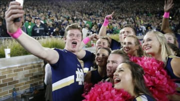 SOUTH BEND, IN - OCTOBER 21: Notre Dame Fighting Irish cheerleaders take a seflie in the second half of a game against the USC Trojans at Notre Dame Stadium on October 21, 2017 in South Bend, Indiana. Notre Dame won 49-14. (Photo by Joe Robbins/Getty Images)