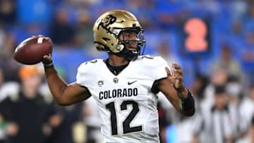 Nov 13, 2021; Pasadena, California, USA; Colorado Buffaloes quarterback Brendon Lewis (12) throws a pass in the second half against the UCLA Bruins at Rose Bowl. Mandatory Credit: Jayne Kamin-Oncea-USA TODAY Sports
