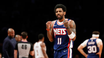 NEW YORK, NEW YORK - APRIL 08: Kyrie Irving #11 of the Brooklyn Nets reacts during the first half against the Cleveland Cavaliers at Barclays Center on April 08, 2022 in the Brooklyn borough of New York City. NOTE TO USER: User expressly acknowledges and agrees that, by downloading and or using this photograph, User is consenting to the terms and conditions of the Getty Images License Agreement. (Photo by Sarah Stier/Getty Images)