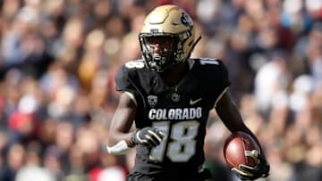 BOULDER, COLORADO - OCTOBER 05: Tony Brown #18 of the Colorado Buffaloes carries the ball after catching a pass against the Arizona Wildcats in the first quarter at Folsom Field on October 05, 2019 in Boulder, Colorado. (Photo by Matthew Stockman/Getty Images)