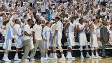 Dec 14, 2013; Chapel Hill, NC, USA; North Carolina Tar Heels players react in the second half. The Tar Heels defeated the Wildcats 82-77 at Dean E. Smith Student Activities Center. Mandatory Credit: Bob Donnan-USA TODAY Sports