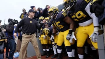 Nov 28, 2015; Ann Arbor, MI, USA; Michigan Wolverines head coach Jim Harbaugh gets set to take the field prior to the game against the Ohio State Buckeyes at Michigan Stadium. Mandatory Credit: Rick Osentoski-USA TODAY Sports