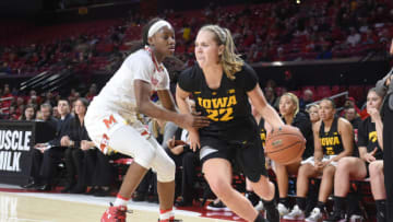 COLLEGE PARK, MD - JANUARY 04: Kathleen Doyle #22 of the Iowa Hawkeyes dribbles the ball during a women's college basketball game against the Maryland Terrapins at Xfinity Center on January 4, 2018 in College Park, Maryland. The Terrapins won 80-64. (Photo by Mitchell Layton/Getty Images)