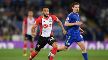 LEICESTER, ENGLAND - APRIL 19: Nathan Redmond of Southampton is challenged by Adrien Silva of Leicester City during the Premier League match between Leicester City and Southampton at The King Power Stadium on April 19, 2018 in Leicester, England. (Photo by Shaun Botterill/Getty Images)