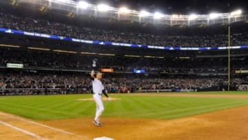 Sep 25, 2014; Bronx, NY, USA; New York Yankees shortstop Derek Jeter (2) celebrates after a walk-off single in the ninth inning of the game against the Baltimore Orioles at Yankee Stadium. Mandatory Credit: Robert Deutsch-USA TODAY Sports