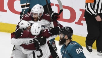 SAN JOSE, CA - MAY 04: Colorado Avalanche left wing J.T. Compher (37), top, and Colorado Avalanche center Alexander Kerfoot (13) celebrate with Colorado Avalanche center Tyson Jost (17) after Jost scored a goal against San Jose Sharks goaltender Martin Jones (31) in the second period at the SAP Center during the game five of the Stanley Cup Western Conference semifinals May 04, 2019. (Photo by Andy Cross/MediaNews Group/The Denver Post via Getty Images)