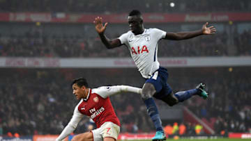 LONDON, ENGLAND - NOVEMBER 18: Alexis Sanchez of Arsenal battles with Davinson Sanchez of Tottenham Hotspur during the Premier League match between Arsenal and Tottenham Hotspur at Emirates Stadium on November 18, 2017 in London, England. (Photo by Mike Hewitt/Getty Images)