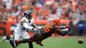 CLEVELAND, OH - OCTOBER 07: David Njoku #85 of the Cleveland Browns is unable to make a catch in front of Terrell Suggs #55 of the Baltimore Ravens in the third quarter at FirstEnergy Stadium on October 7, 2018 in Cleveland, Ohio. (Photo by Joe Robbins/Getty Images)