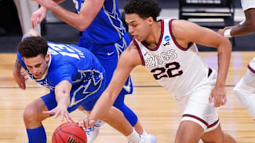 Gonzaga Bulldogs forward Anton Watson (22) steals a ball from Creighton Bluejays forward Christian Bishop (13) during the Sweet Sixteen round of the 2021 NCAA Tournament on Sunday, March 28, 2021, at Hinkle Fieldhouse in Indianapolis, Ind. Gonzaga Bulldogs won 83-65.Ncaa Basketball Ncaa Tournament Gonzaga Vs Creighton