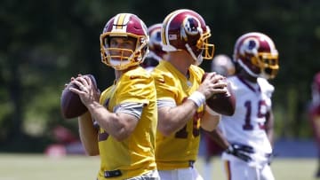 Jun 14, 2016; Ashburn, VA, USA; Washington Redskins quarterback Kirk Cousins (8) and Redskins quarterback Colt McCoy (16) participate in drills as part of day one of minicamp at Redskins Park. Mandatory Credit: Geoff Burke-USA TODAY Sports