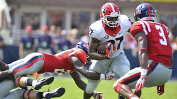 Sep 24, 2016; Oxford, MS, USA; Georgia Bulldogs running back Nick Chubb (27) runs the ball during the second quarter of the game against the Mississippi Rebels at Vaught-Hemingway Stadium. Mandatory Credit: Matt Bush-USA TODAY Sports