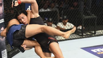 BOISE, ID - JULY 14: (R-L) Cat Zingano takes down Marion Reneau in their women's bantamweight fight during the UFC Fight Night event inside CenturyLink Arena on July 14, 2018 in Boise, Idaho. (Photo by Josh Hedges/Zuffa LLC/Zuffa LLC via Getty Images)