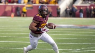 Nov 8, 2014; Minneapolis, MN, USA; Minnesota Golden Gophers running back David Cobb (27) rushes with the ball in the first half against the Iowa Hawkeyes at TCF Bank Stadium. Mandatory Credit: Jesse Johnson-USA TODAY Sports