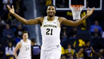 Dec 13, 2016; Ann Arbor, MI, USA; Michigan Wolverines guard Zak Irvin (21) reacts after making a three point basket in the second half against the Central Arkansas Bears at Crisler Center. Michigan won 97-53. Mandatory Credit: Rick Osentoski-USA TODAY Sports
