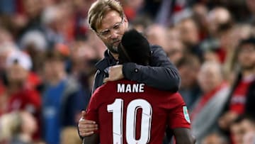 LIVERPOOL, ENGLAND - SEPTEMBER 26: Sadio Mane of Liverpool is embraced by Jurgen Klopp, Manager of Liverpool during the Carabao Cup Third Round match between Liverpool and Chelsea at Anfield on September 26, 2018 in Liverpool, England. (Photo by Jan Kruger/Getty Images)
