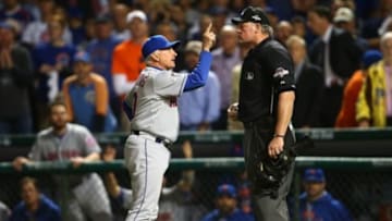October 20, 2015; Chicago, IL, USA; New York Mets manager Terry Collins (10) argues a call with umpire Ted Barrett (65) during the sixth inning against the Chicago Cubs in game three of the NLCS at Wrigley Field. Mandatory Credit: Jerry Lai-USA TODAY Sports