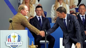 Sep 23, 2021; Haven, Wisconsin, USA; Team USA captain Steve Stricker and Team Europe captain Padraig Harrington shake hands during the opening ceremony for the 43rd Ryder Cup golf competition at Whistling Straits. Mandatory Credit: Kyle Terada-USA TODAY Sports