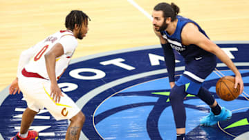 MINNEAPOLIS, MN - JANUARY 31: Ricky Rubio #9 of the Minnesota Timberwolves dribbles the ball as Darius Garland #10 of the Cleveland Cavaliers guards him during the third quarter at Target Center on January 31, 2021 in Minneapolis, Minnesota. NOTE TO USER: User expressly acknowledges and agrees that, by downloading and or using this photograph, User is consenting to the terms and conditions of the Getty Images License Agreement. (Photo by Harrison Barden/Getty Images)