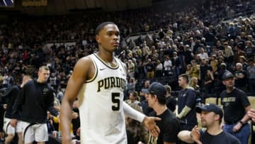 Purdue guard Brandon Newman (5) high-fives fans after Purdue defeated Indiana, 69-67, Saturday, March 5, 2022 at Mackey Arena in West Lafayette.Bkc Purdue Vs Indiana