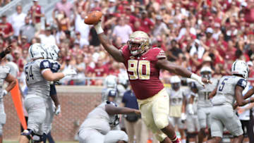 September 10 2016: Florida State DT Demarcus Christmas (90) celebrates after recovering a fumble during the game between the Florida State Seminoles and the Charleston Southern Buccaneers at Doak Campbell Stadium in Tallahassee, FL. (Photo by Logan Stanford/Icon Sportswire via Getty Images)