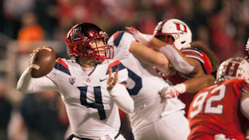 SALT LAKE CITY, UT- OCTOBER 12 : Rhett Rodriguez #4 of the Arizona Wildcats throws under pressure during their game against the Utah Utes at Rice Eccles Stadium on October 12, 2018 in Salt Lake City , Utah. (Photo by Chris Gardner/Getty Images)