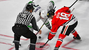 KENT, WASHINGTON - DECEMBER 28: Matthew Rempe #32 of the Seattle Thunderbirds, left, and Tyson Kozak #18 of the Portland Winterhawks face-off during the third period of the match at the accesso ShoWare Center on December 28, 2019 in Kent, Washington. The Portland Winterhawks top the Seattle Thunderbirds 4-1. (Photo by Alika Jenner/Getty Images)
