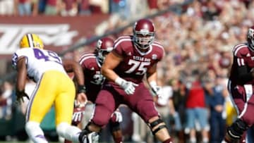 Oct 20, 2012; College Station, TX, USA; Texas A&M Aggies offensive linesman Jake Matthews (75) blocks against the LSU Tigers in the first quarter at Kyle Field. Mandatory Credit: Brett Davis-USA TODAY Sports