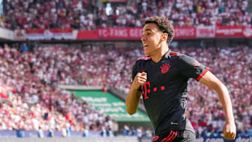 Jamal Musiala celebrating after scoring the winner against FC Koln to help Bayern Munich win the Bundesliga title. (Photo by Rene Nijhuis/BSR Agency/Getty Images)