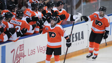 PRAGUE, CZECH REPUBLIC - OCTOBER 4: Travis Konecny #11 of the Philadelphia Flyers celebrates his second period goal against the Chicago Blackhawks with teammates at the players bench during the Global Series Challenge game at O2 Arena on October 4, 2019 in Prague, Czech Republic. (Photo by Andre Ringuette/NHLI via Getty Images)