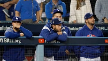 LOS ANGELES, CA - OCTOBER 28: Clayton Kershaw #22 of the Los Angeles Dodgers looks on from the dugout against the Boston Red Sox during the eighth inning in Game Five of the 2018 World Series at Dodger Stadium on October 28, 2018 in Los Angeles, California. (Photo by Sean M. Haffey/Getty Images)