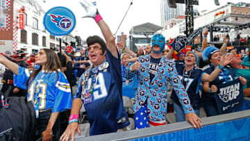 NASHVILLE, TENNESSEE - APRIL 25: Fans of the Tennessee Titans attend Day 1 of the 2019 NFL Draft on April 25, 2019 in Nashville, Tennessee. (Photo by Frederick Breedon/Getty Images)