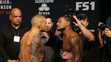 Sep 16, 2016; Hidalgo, TX, USA; Dustin Poirier and Michael Johnson face off after weigh in for UFC Fight Night 94 at State Farm Arena. Mandatory Credit: Sean Pokorny-USA TODAY Sports