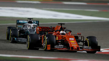 BAHRAIN, BAHRAIN - MARCH 31: Sebastian Vettel of Germany driving the (5) Scuderia Ferrari SF90 leads Lewis Hamilton of Great Britain driving the (44) Mercedes AMG Petronas F1 Team Mercedes W10 on track during the F1 Grand Prix of Bahrain at Bahrain International Circuit on March 31, 2019 in Bahrain, Bahrain. (Photo by Charles Coates/Getty Images)