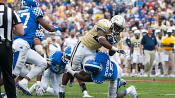JACKSONVILLE, FL - DECEMBER 31: Georgia Tech Yellowjackets running back Dedrick Mills (26) makes a run during the TaxSlayer Bowl game between the Georgia Tech Yellowjackets and the University of Kentucky Wildcats on December 31, 2016, at EverBank Field in Jacksonville, FL.(Photo by Aaron Gilbert/Icon Sportswire via Getty Images)