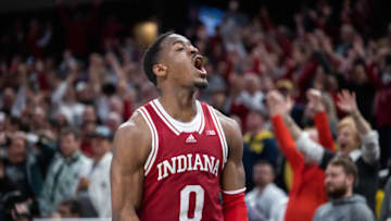Mar 10, 2022; Indianapolis, IN, USA; Indiana Hoosiers guard Xavier Johnson (0) celebrates in the second half against the Michigan Wolverines at Gainbridge Fieldhouse. Mandatory Credit: Trevor Ruszkowski-USA TODAY Sports