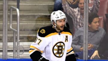 Mar 7, 2016; Sunrise, FL, USA; Boston Bruins center Patrice Bergeron (37) reacts after his goal in the first period of a game against the Florida Panthers at BB&T Center. Mandatory Credit: Robert Mayer-USA TODAY Sports