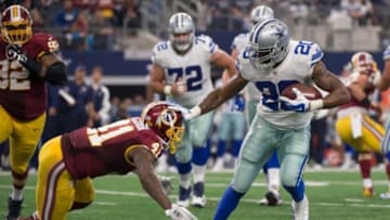 Jan 3, 2016; Arlington, TX, USA; Washington Redskins cornerback Will Blackmon (41) and Dallas Cowboys running back Darren McFadden (20) during the game at AT&T Stadium. The Redskins defeat the Cowboys 34-23. Mandatory Credit: Jerome Miron-USA TODAY Sports