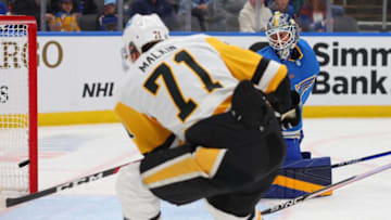 ST LOUIS, MO - FEBRUARY 25: Jordan Binnington #50 of the St. Louis Blues allows a shot by Evgeni Malkin #71 of the Pittsburgh Penguins in the second period of the game at Enterprise Center on February 25, 2023 in St Louis, Missouri. (Photo by Dilip Vishwanat/Getty Images)