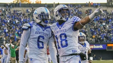 NASHVILLE, TENNESSEE - NOVEMBER 16: Wide receiver Josh Ali #6 of the Kentucky Wildcats is congratulated by teammate wide receiver Clevan Thomas Jr. #18 after scoring a touchdown against the Vanderbilt Commodores during the first half at Vanderbilt Stadium on November 16, 2019 in Nashville, Tennessee. (Photo by Frederick Breedon/Getty Images)