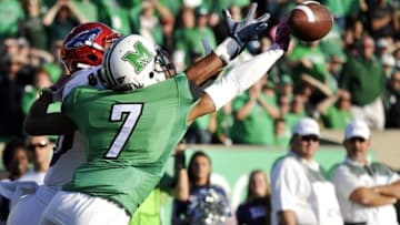 Oct 25, 2014; Huntington, WV, USA; Marshall Thundering Herd defensive back Darryl Roberts (7) deflects a pass intended for Florida Atlantic Owls tight end Nate Terry (80) in the second quarter at Joan C. Edwards Stadium. Mandatory Credit: Michael Shroyer-USA TODAY Sports