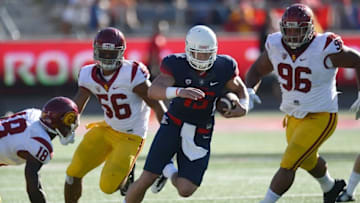 Oct 15, 2016; Tucson, AZ, USA; Arizona Wildcats tight end Matt Morin (15) carries the ball past USC Trojans defenders during the second half at Arizona Stadium. The Trojans won 48-14. Mandatory Credit: Joe Camporeale-USA TODAY Sports