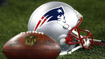 Sep 3, 2015; Foxborough, MA, USA; A general view of a football and a New England Patriots helmet during the second half of a game against the New York Giants at Gillette Stadium. Mandatory Credit: Mark L. Baer-USA TODAY Sports