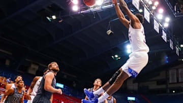 Dec 3, 2020; Lawrence, Kansas, USA; Kansas Jayhawks forward David McCormack (33) dunks against the Washburn Ichabods during the first half at Allen Fieldhouse. Mandatory Credit: Jay Biggerstaff-USA TODAY Sports