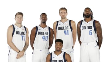 DALLAS, TX - SEPTEMBER 21: (L-R) Luka Doncic #77 Harrison Barnes #40 Dirk Nowitzki #41 DeAndre Jordan #6 and Dennis Smith Jr. #1 of the Dallas Mavericks pose for a portrait during the Dallas Mavericks Media Day on September 21, 2018 at the American Airlines Center in Dallas, Texas. NOTE TO USER: User expressly acknowledges and agrees that, by downloading and or using this photograph, User is consenting to the terms and conditions of the Getty Images License Agreement. Mandatory Copyright Notice: Copyright 2018 NBAE (Photo by Glenn James/NBAE via Getty Images)