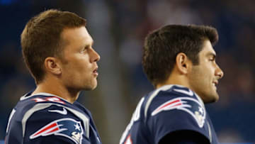FOXBORO, MA - AUGUST 31: Tom Brady #12 and Jimmy Garoppolo #10 of the New England Patriots watch the action against the New York Giants in the second half during a preseason game on August 31, 2017 in Foxboro, Massachusetts. (Photo by Jim Rogash/Getty Images)