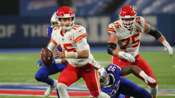 ORCHARD PARK, NY - OCTOBER 19: Darryl Johnson #92 of the Buffalo Bills dives to try and tackle Patrick Mahomes #15 of the Kansas City Chiefs as he looks to throw a pass during the second half at Bills Stadium on October 19, 2020 in Orchard Park, New York. Kansas City beats Buffalo 26-17. (Photo by Timothy T Ludwig/Getty Images)