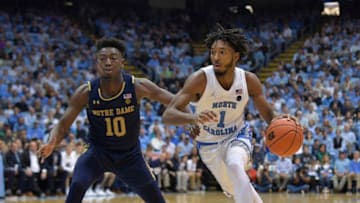 CHAPEL HILL, NORTH CAROLINA - NOVEMBER 06: Leaky Black #1 of the North Carolina Tar Heels drives against TJ Gibbs #10 of the Notre Dame Fighting Irish during their game at the Dean Smith Center on November 06, 2019 in Chapel Hill, North Carolina. North Carolina won 76-65. (Photo by Grant Halverson/Getty Images)