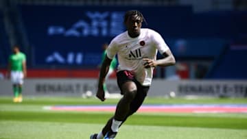 Paris Saint-Germain's Italian forward Moise Kean controls the ball during warm up session prior to the start of the French L1 football match between Paris-Saint Germain (PSG) and Saint-Etienne at the Parc des Princes Stadium, in Paris, on April 18, 2021. (Photo by FRANCK FIFE / AFP) (Photo by FRANCK FIFE/AFP via Getty Images)